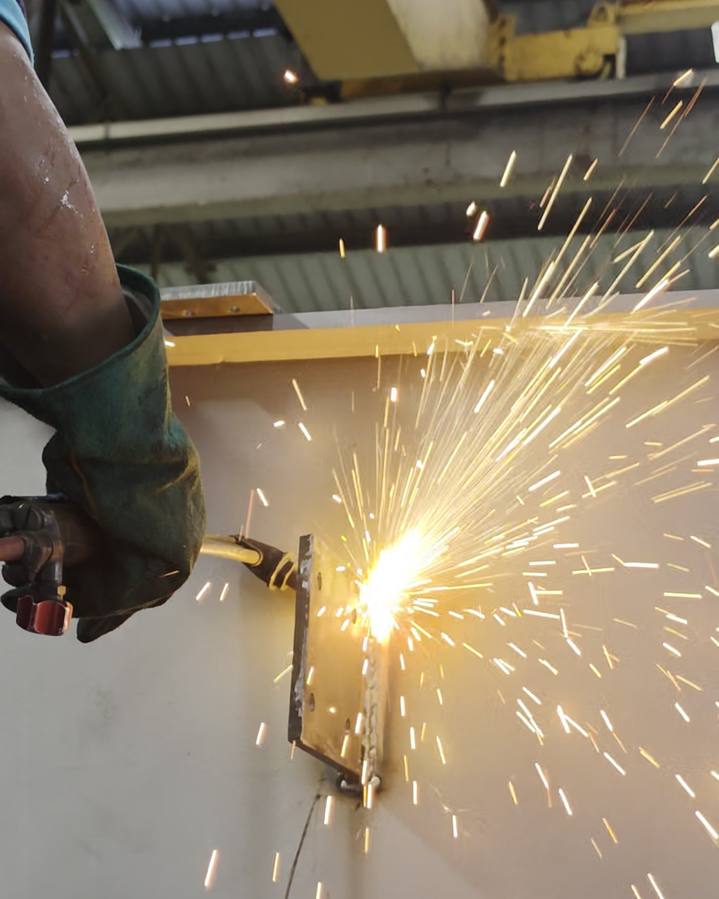 Grinding and finishing a crane component at Toptek